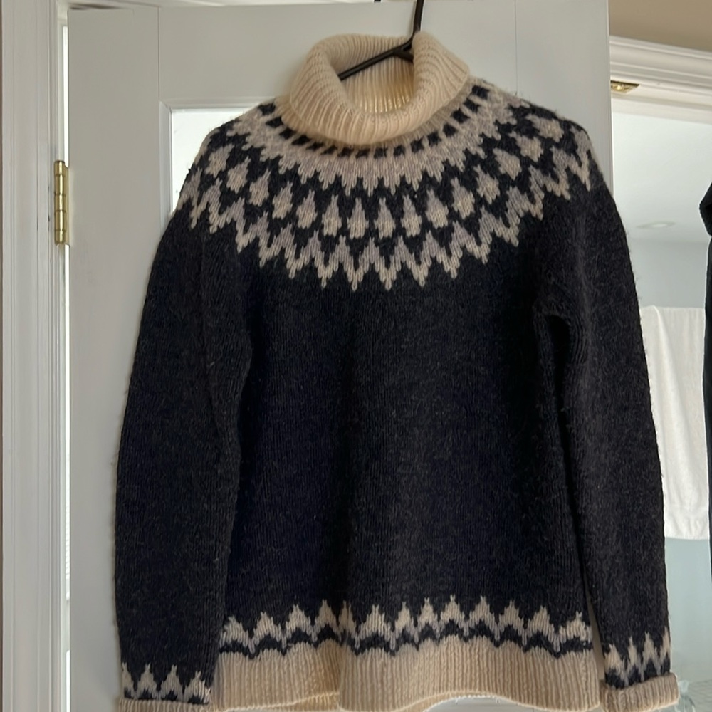 INC 100% wool sweater. It is a size small however fits like a medium.